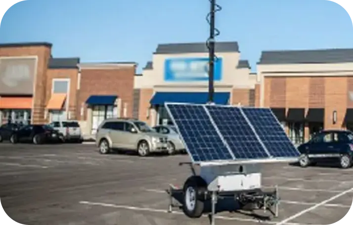 Mobile Security Trailers Mobile security trailer with solar panels providing video surveillance in a shopping center parking lot