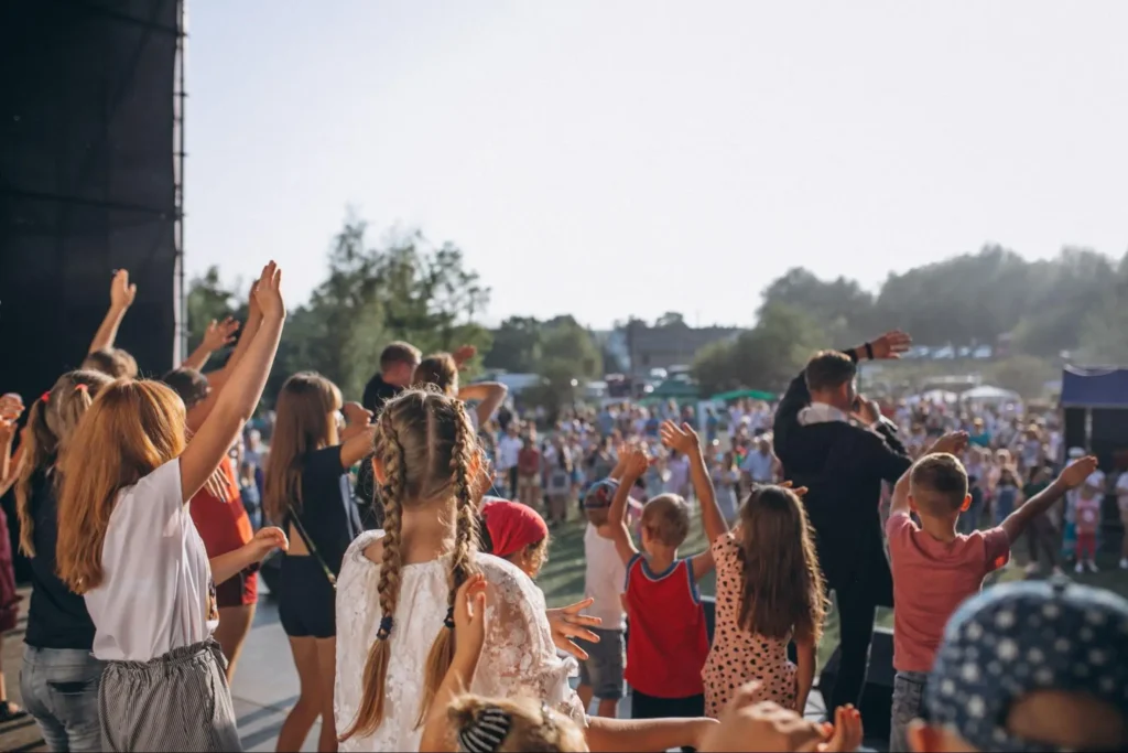 Family-Friendly Event Security | American Security Force Children and families enjoying an outdoor event with crowd safety supported by American Security Force event security services