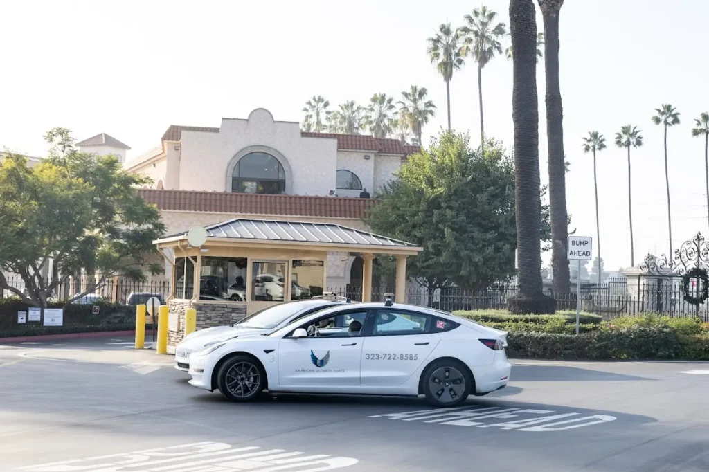 Residential Security Patrol Vehicle | American Security Force American Security Force patrol vehicle providing residential security services at a gated community entrance